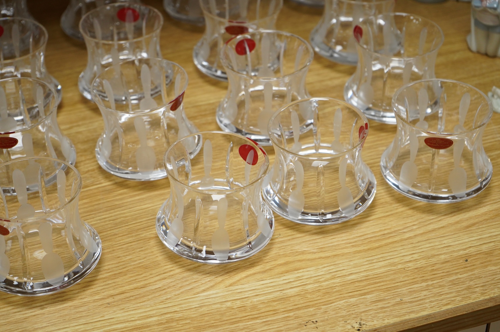 A collection of twenty five Uri Geller Crystal Collection whisky tumblers by Dickenson Crystal, 9cm high